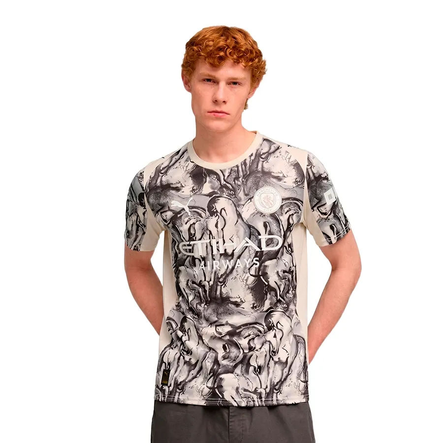 Imagen 0 de 5 de Camiseta Puma Manchester City Year of the Horse-CRUDO/NEGRO